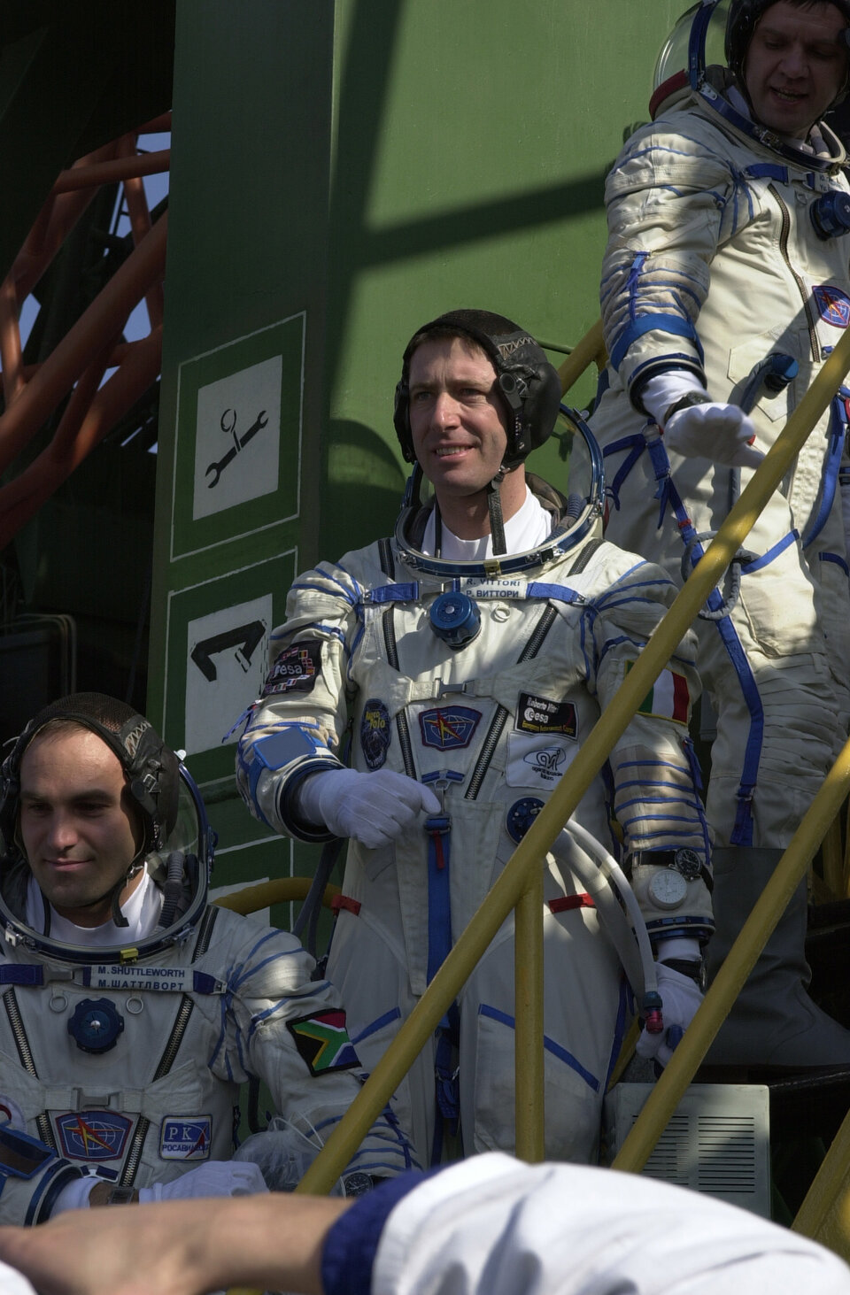 Marco Polo crew climb the steps to the Soyuz launcher