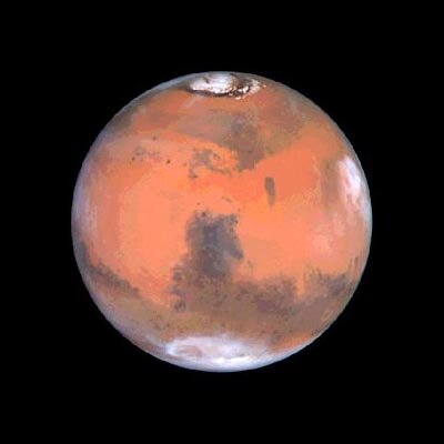 Mars met zijn poolkappen, waargenomen met de Hubbel Space Telescope in 2000