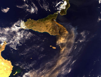 Smoke and ash drifts toward the African coast from Mount Etna in this ESA MERIS image of 28 October, 2002