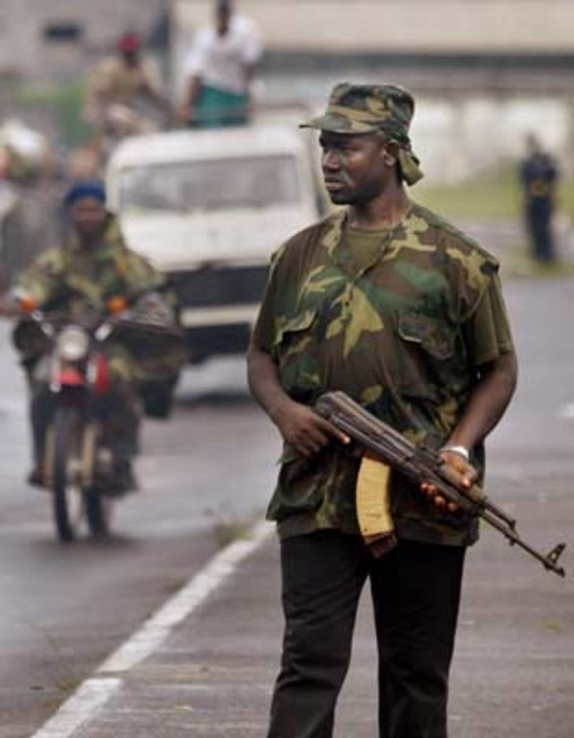 A government soldier on patrol in Monrovia, Liberia
