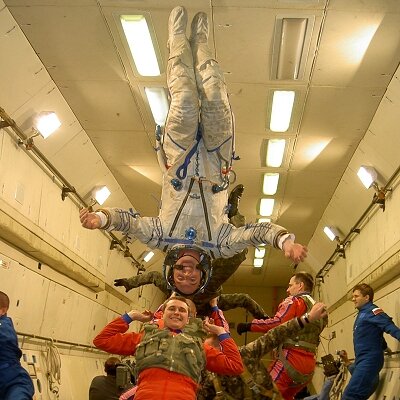 Using a space suit during the training exercise in weightlesness