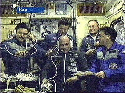 André Kuipers with ISS Expedition crews eight and nine shortly after ingress
