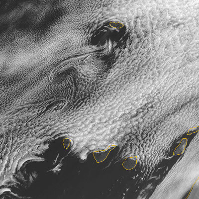 Von Karman vortex streets to the lee of Madeira Island (06 August 2003)