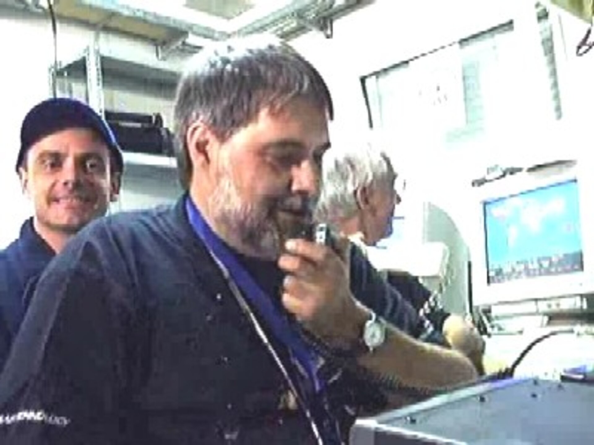 Video screen of Rolf Maarschalkerweerd and Alessandro Donati in contact with ISS