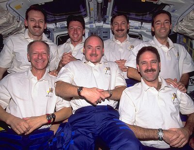 Clervoy and Smith flew together on STS-103, a Hubble servicing mission