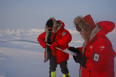 Taking snow depth measurements