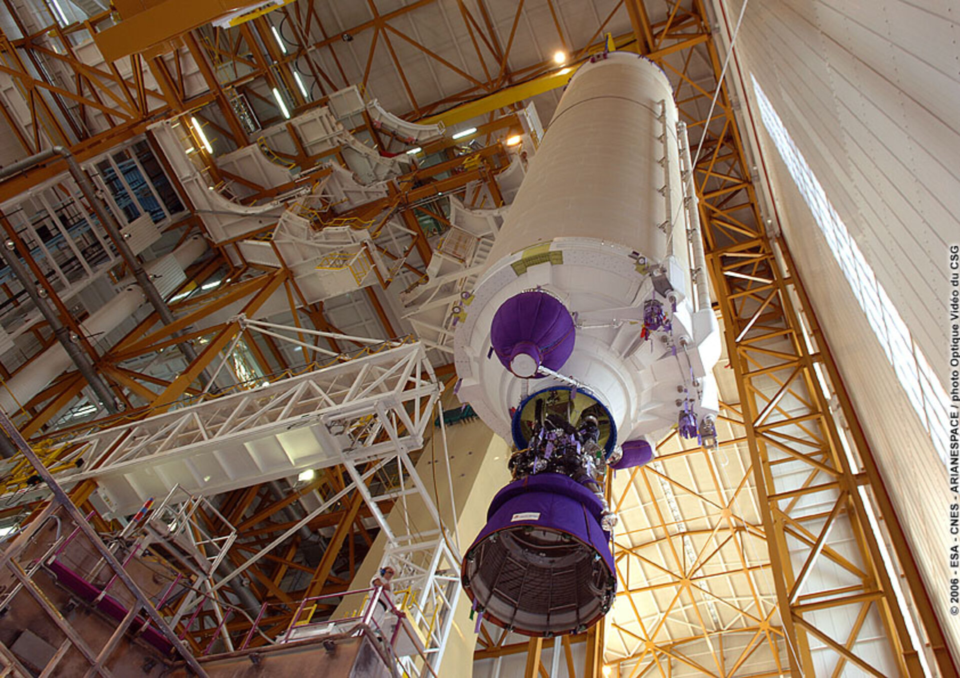 The Core Cryogenic Stage for Ariane 5 is hoisted into vertical position in the Launcher Integration Building