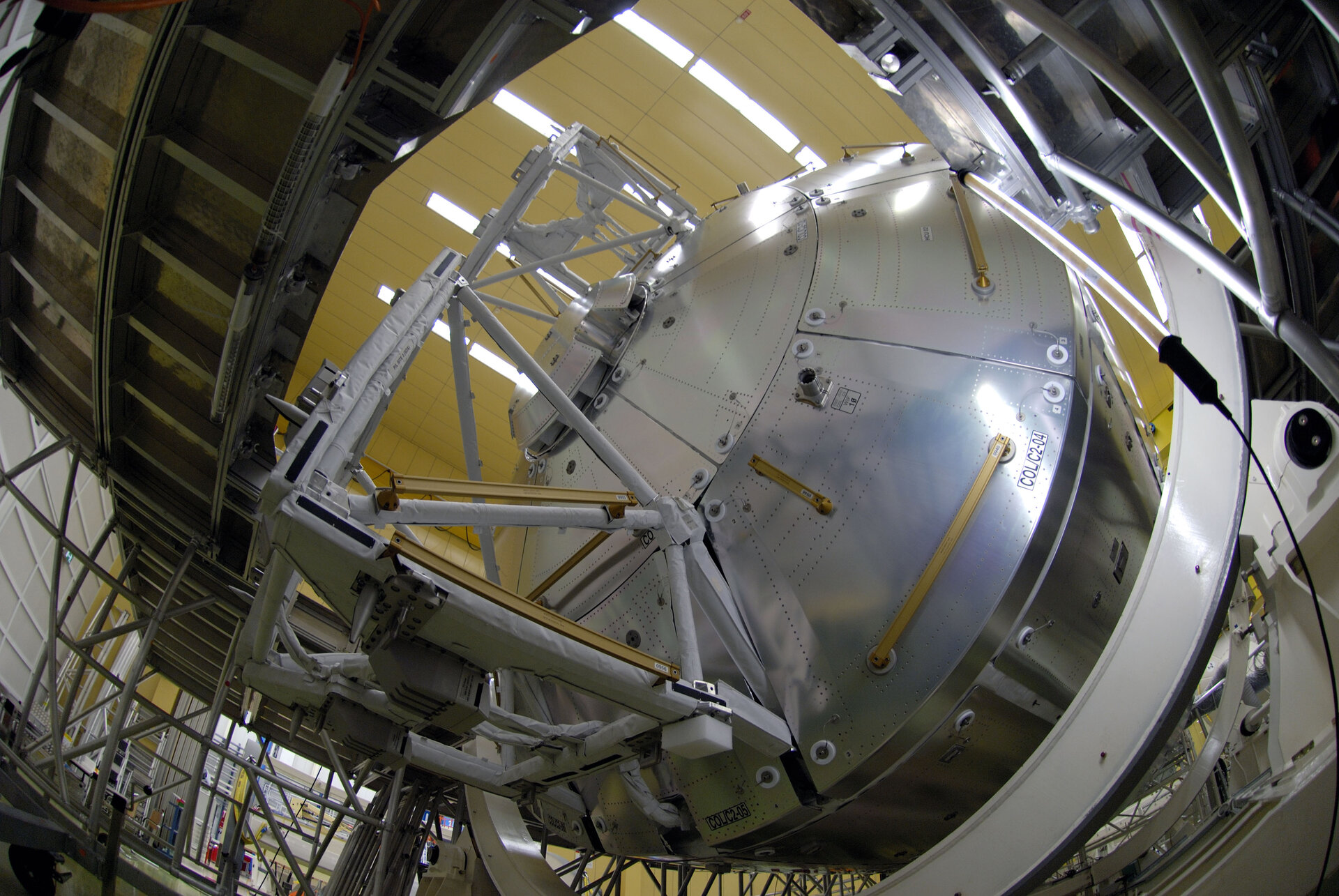 Columbus laboratory is lowered into container ahead of transportation to Florida