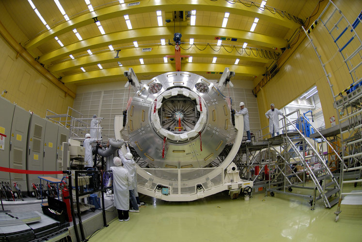 Columbus laboratory is lowered into container ahead of transportation to Florida