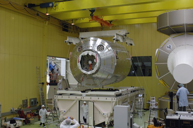 Columbus laboratory is lowered into container ahead of transportation to Florida