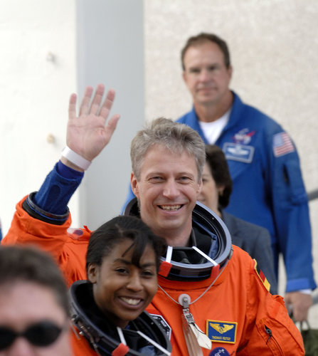 STS-121 crewmembers Thomas Reiter and Stephanie Wilson on their way to the practice countdown at Kennedy Space Center