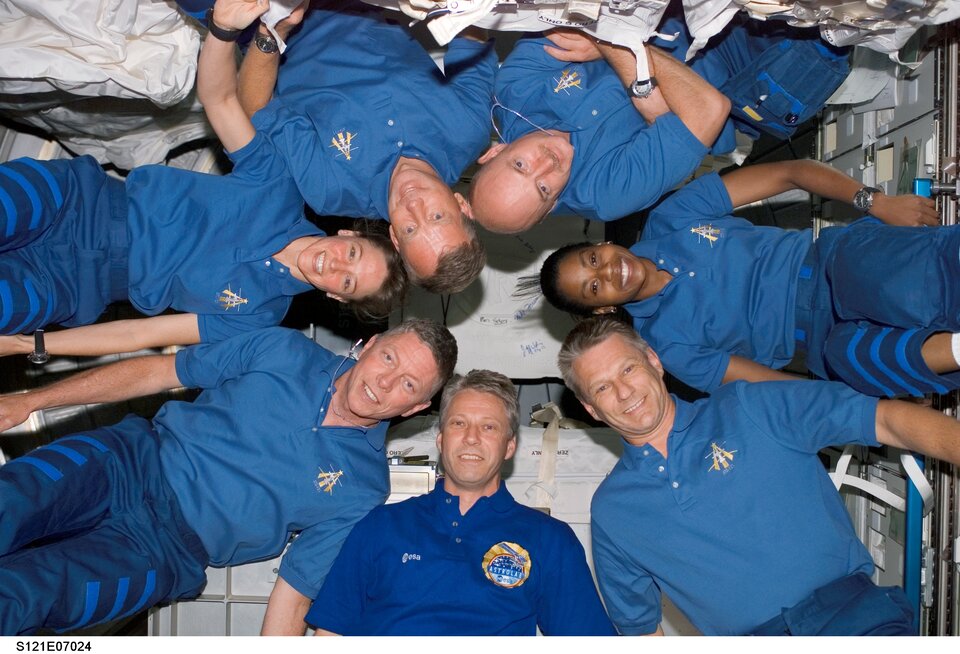 Reiter arrived at the Station with the STS-121 crew