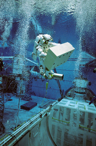 Astronaut Christer Fuglesang participates in an underwater simulation of extravehicular activity (EVA)