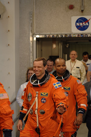 ESA astronaut Christer Fuglesang and the rest of the STS-116 crew on their way to the launch pad for the practice countdown