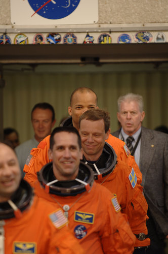 ESA astronaut Christer Fuglesang and the rest of the STS-116 crew, walkout for the practice countdown at KSC