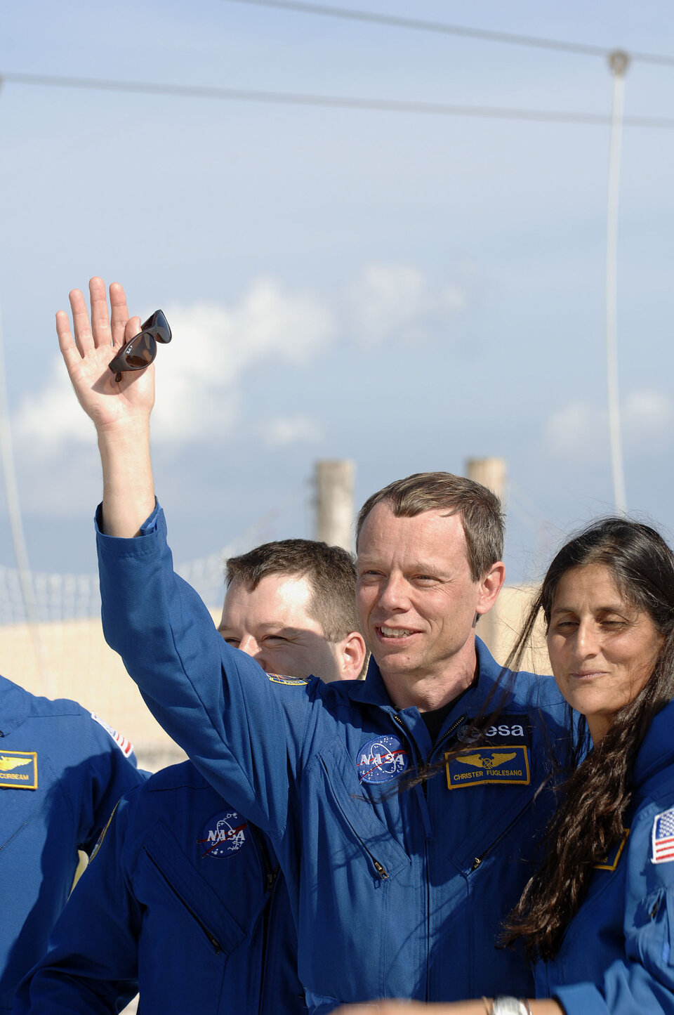 ESA astronaut Christer Fuglesang and the rest of the STS-116 Space Shuttle mission crew near the launch pad area