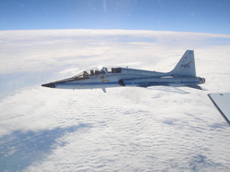 The STS-116 crew flew to NASA's Kennedy Space Center on board T-38 jets