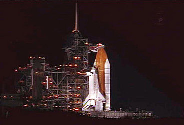 Space Shuttle Discovery awaits launch on Pad 39B