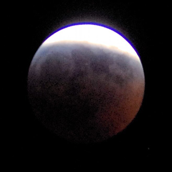 The moon during the first partial phase of the eclipse