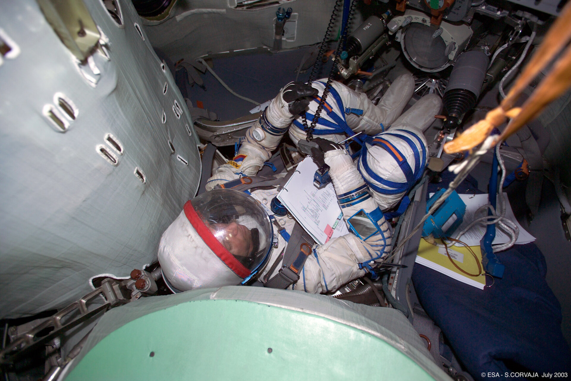 Thomas Reiter training inside the Soyuz simulator