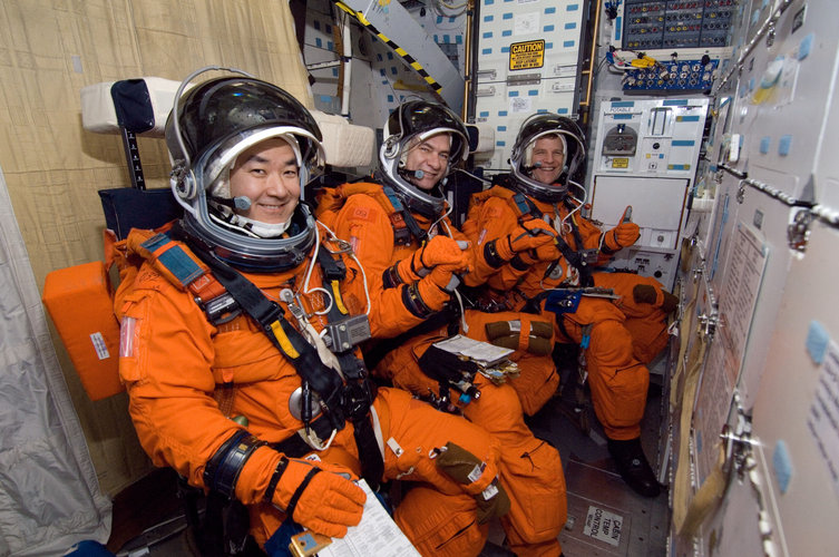 Astronauts Daniel M. Tani (left), European Space Agency's (ESA) Paolo Nespoli and Scott E. Parazynski