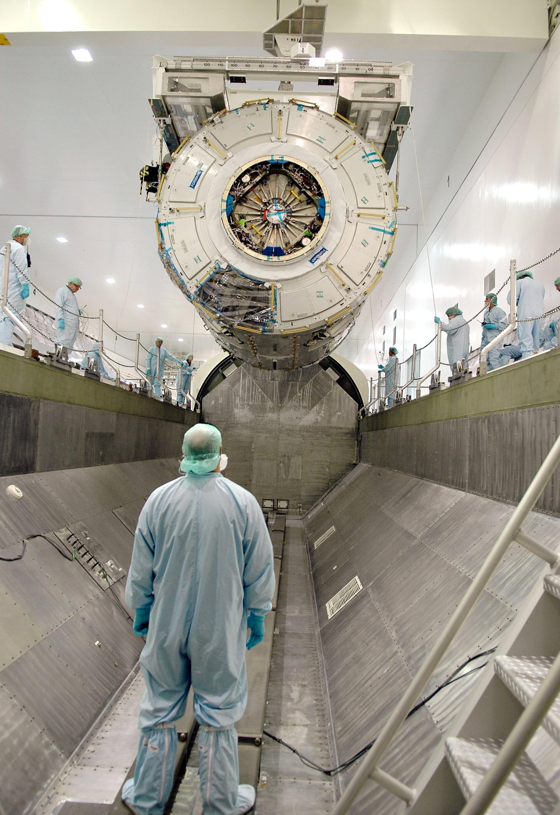 Node 2 is lowered into a payload canister