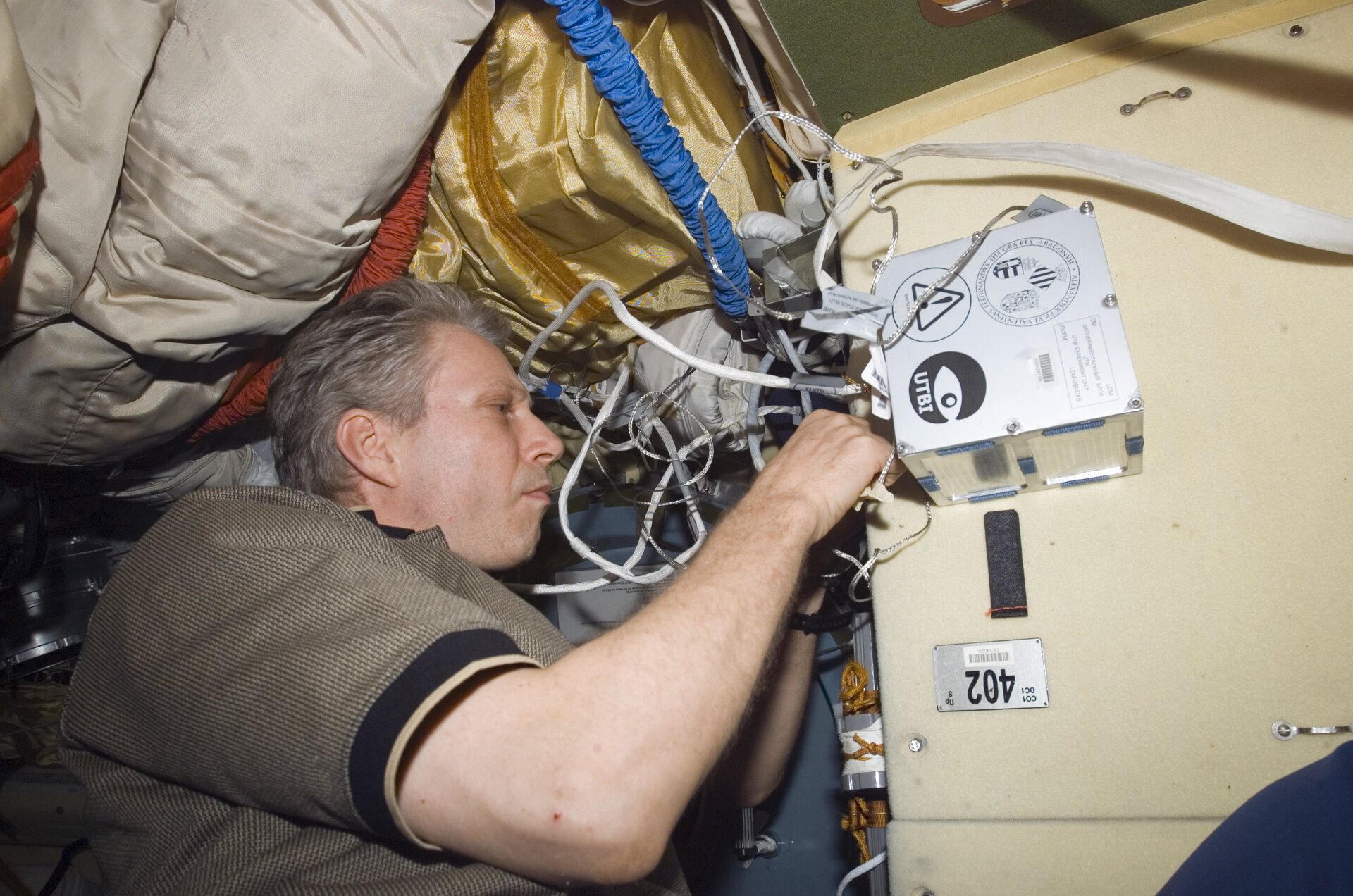 ESA astronaut Thomas Reiter working on UTBI, which flew on board the ISS in October 2006