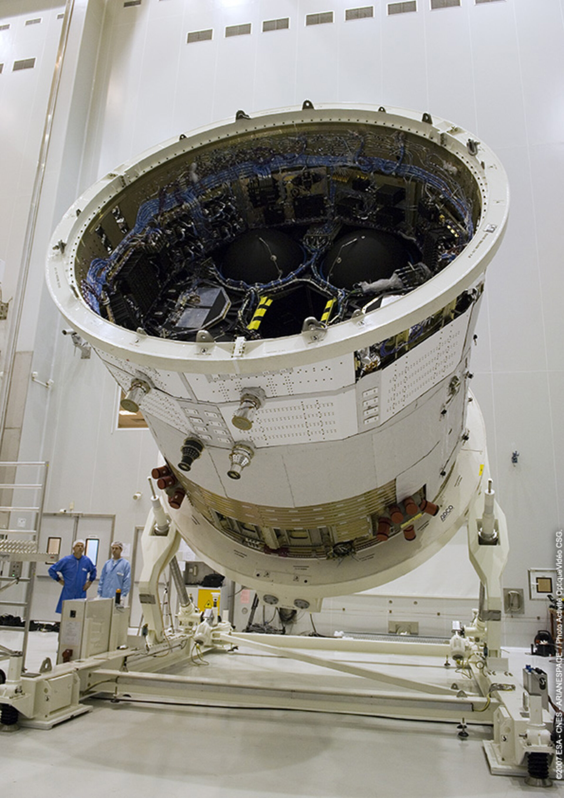 A section of Jules Verne ATV is rotated in order to attach the solar arrays to the spacecraft