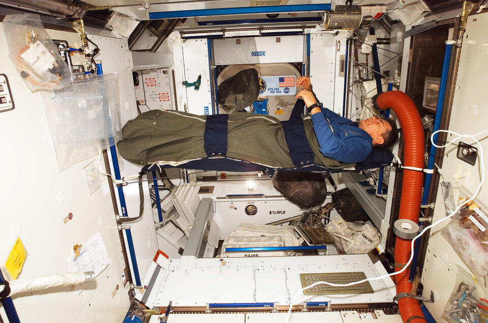 ESA astronaut Paolo Nespoli in sleeping bag on Station