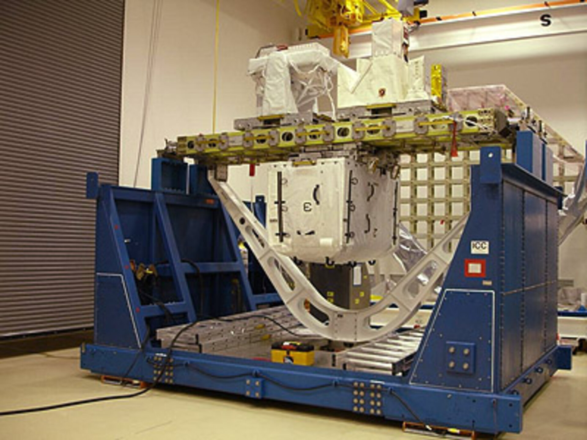 The Columbus external facilities, Solar and EuTEF, are prepared for the paylaod canister at NASA's Kennedy Space Center, Florida