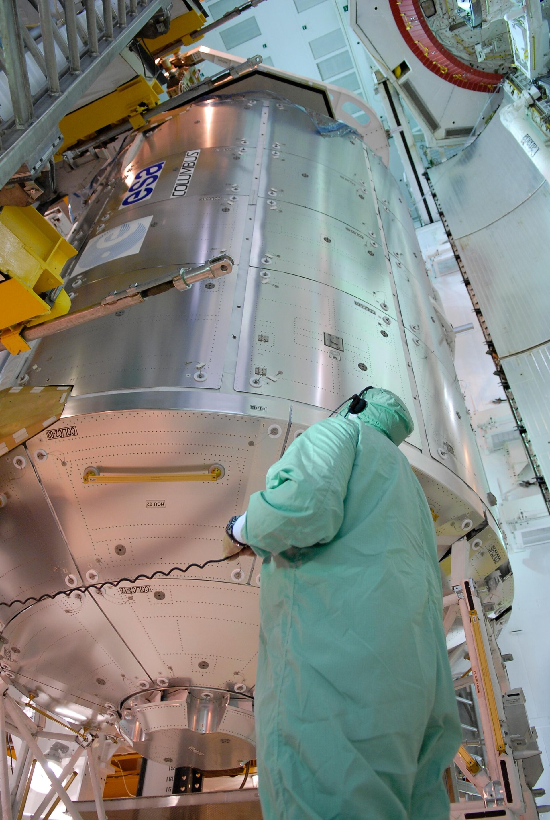 The European Columbus laboratory is transferred into Space Shuttle Atlantis' payload bay