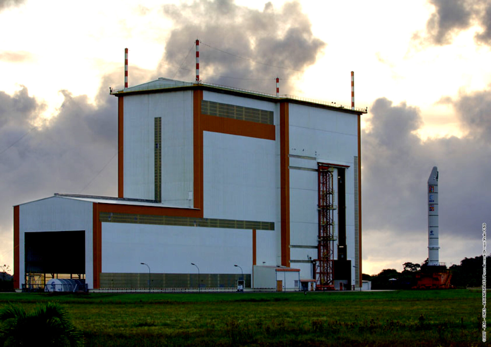 Solid rocket booster for Jules Verne's Ariane 5 ES launch vehicle is transported to the Launcher Integration Building