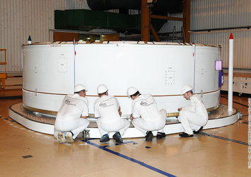 Engineers at Europe's Spaceport in Kourou, French Guiana, prepare the Ariane 5 ES ATV for the Jules Verne flight