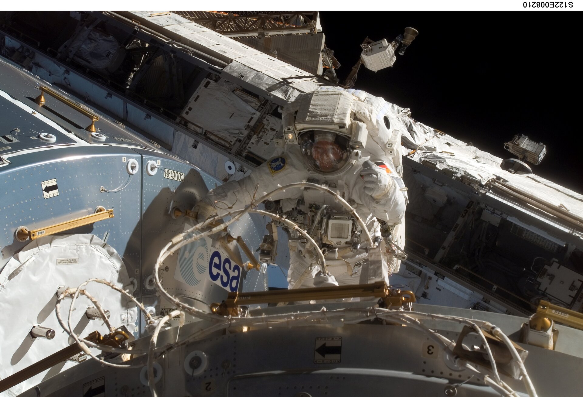 ESA astronaut Hans Schlegel during his first spacewalk