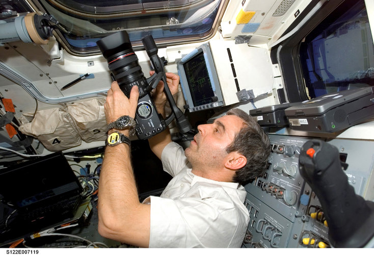 ESA astronaut Leopold Eyharts records ISS docking from Space Shuttle Atlantis'