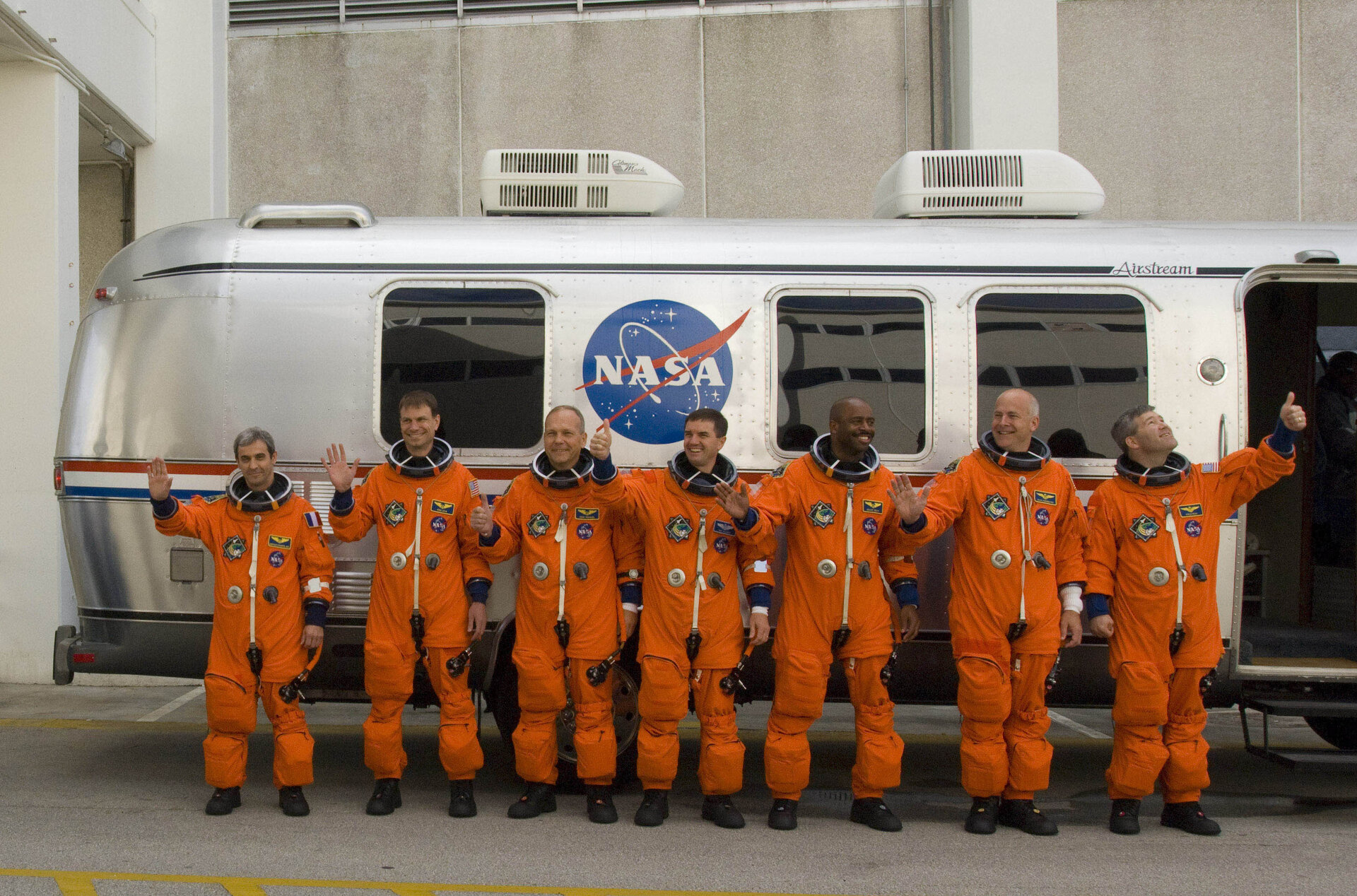 STS-122 mission crew during walk out