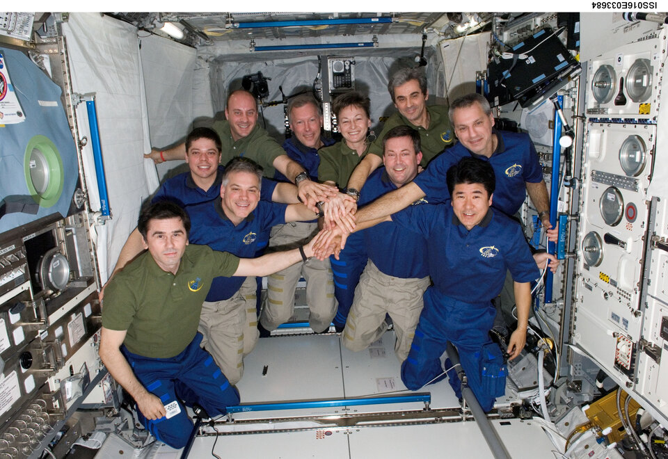 STS-123 and Expedition 16 crews together
