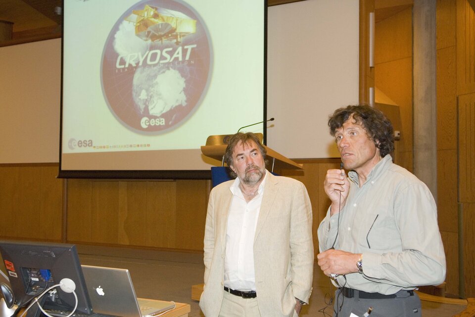 Alain Hubert (right) hands over snow-depth data to Richard Francis CryoSat's Project Manager