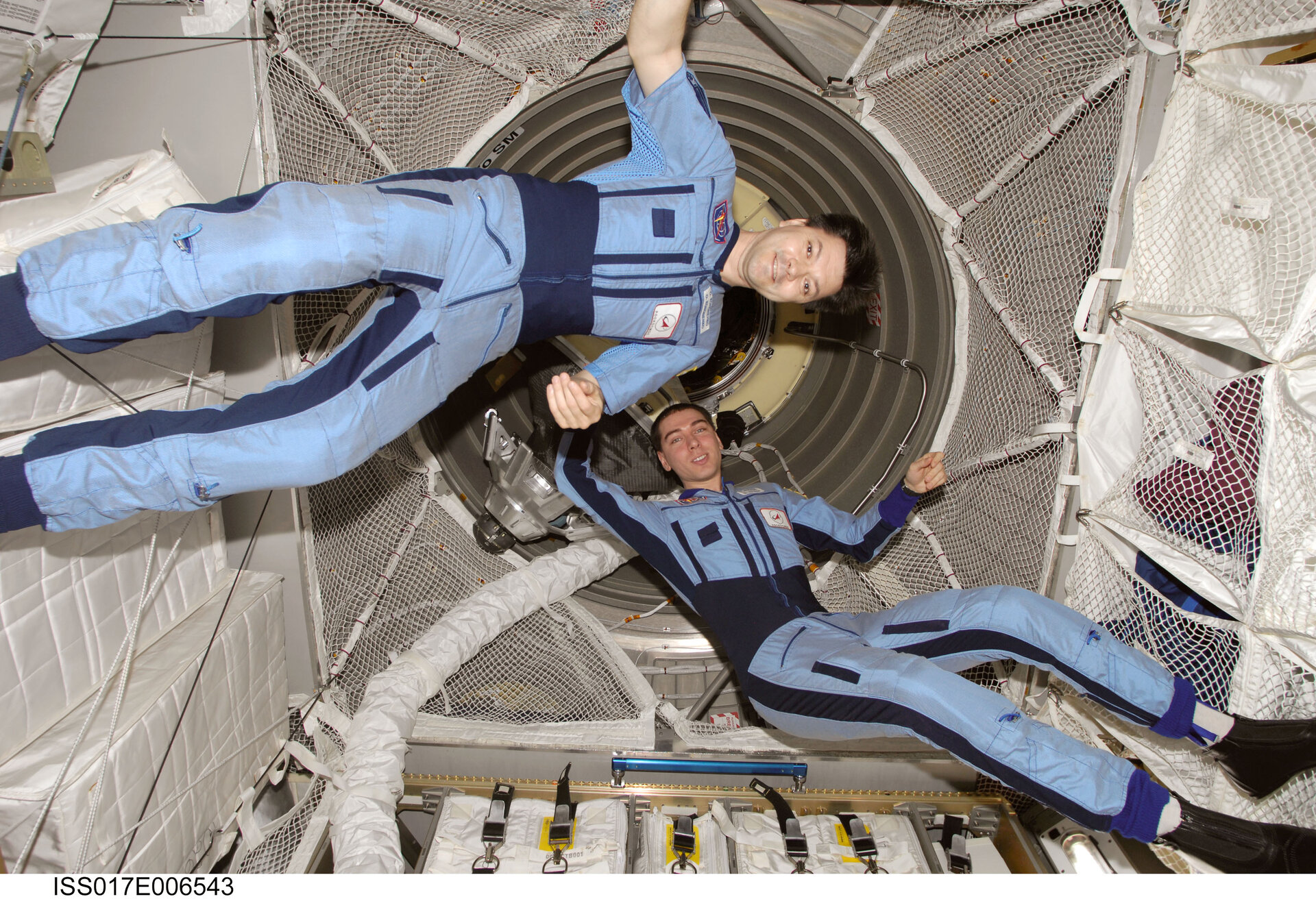 Expedition 17 crewmembers Volkov and Kononenko inside ATV