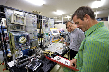 Canadian Space Agency astronauts Robert Thirsk and Chris Hadfield during experiment training at Tsukuba Space Center, Japan