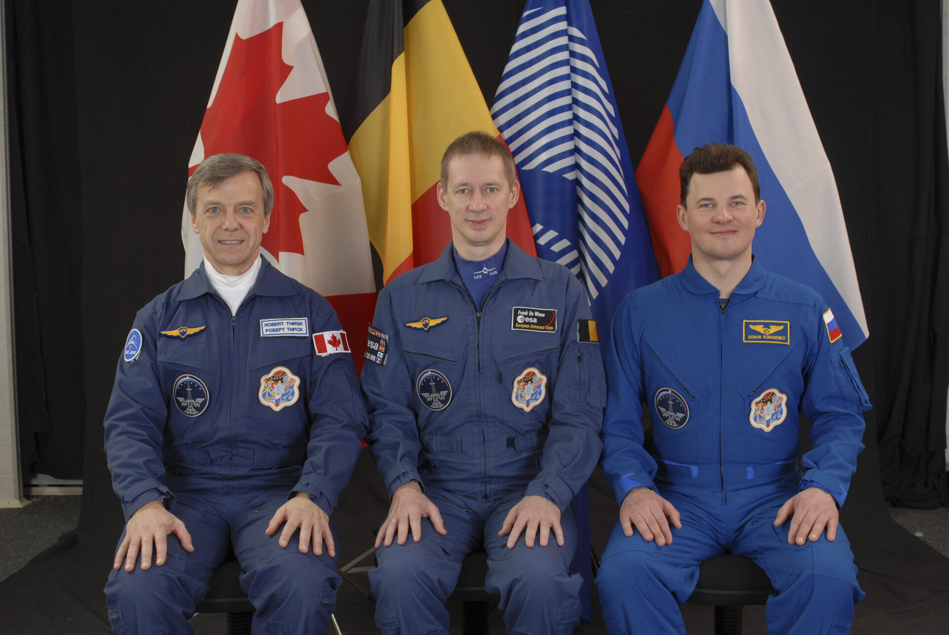 Frank De Winne with fellow ISS Expedition 20/21 crewmembers Robert Thirsk and Roman Romanenko