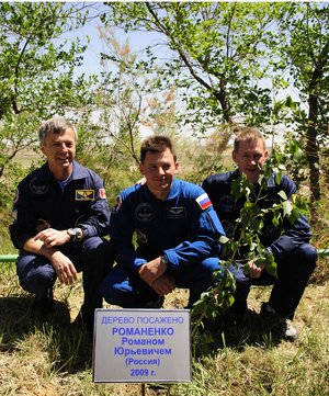 The Soyuz TMA-15 crew take part in the traditional tree-planting ceremony ahead of their launch to the ISS