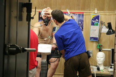 Oliver checks Oleg's electrodes