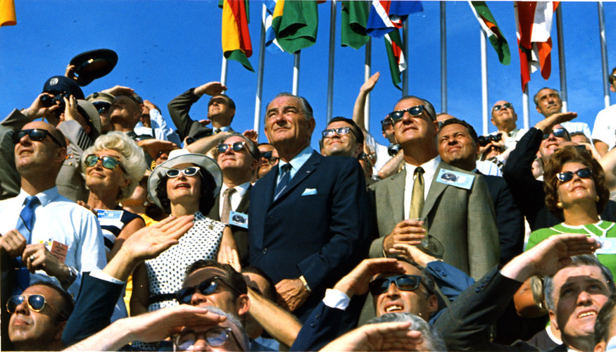 Vice-President Agnew and former President Johnson view the launch