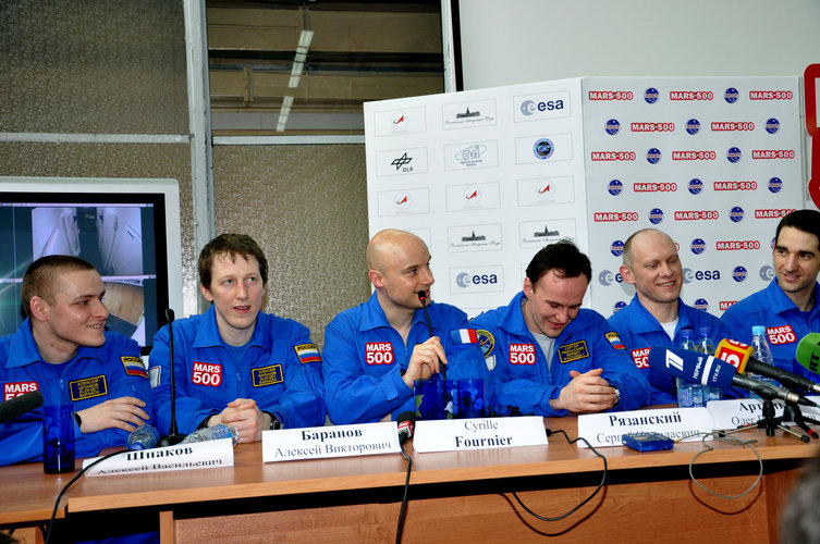 The Mars500 crew attend a press conference after completion of the 105-day study