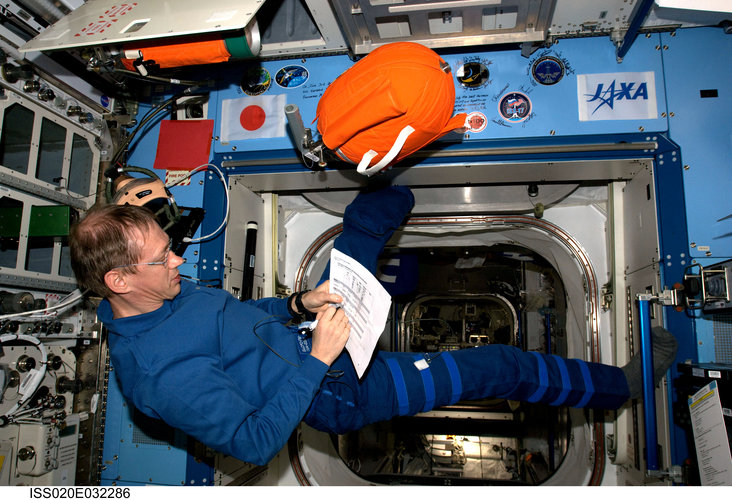 Frank De Winne conducts monthly inspection of fire equipment in the Japanese Kibo laboratory