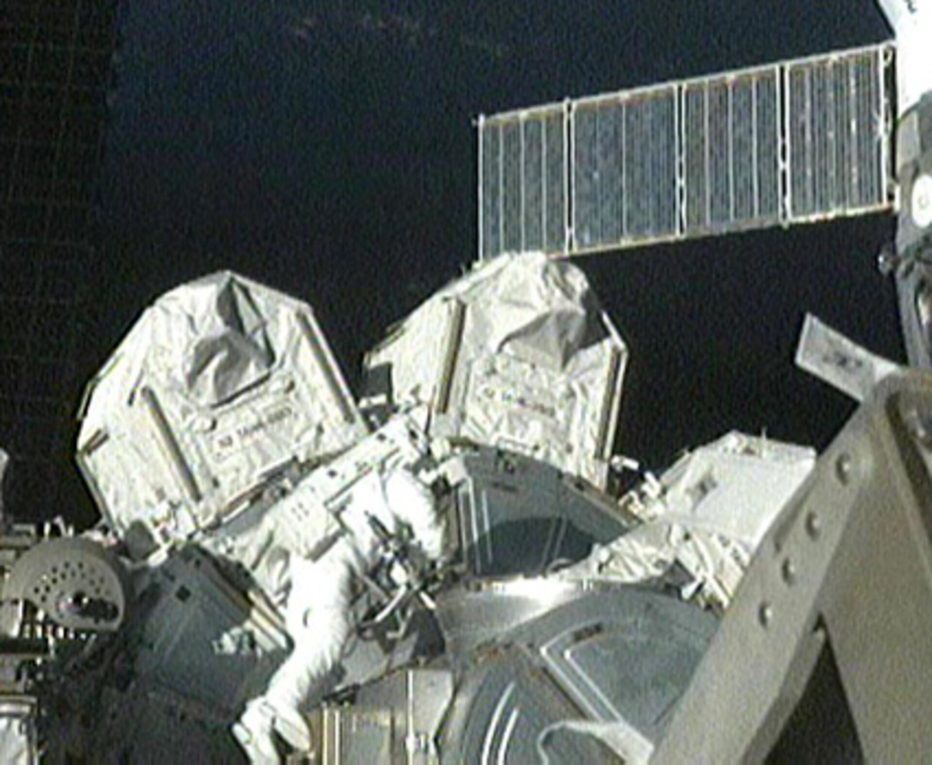 Fuglesang exits Quest Airlock at start of the third STS-128 spacewalk
