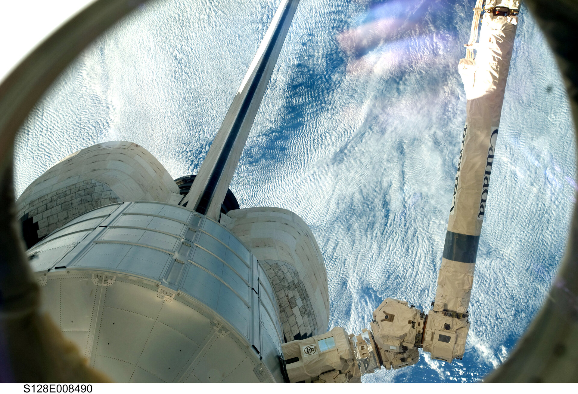 Leonardo MPLM is placed back in the Space Shuttle's payload bay for the return home