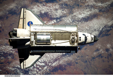 Space Shuttle Discovery approaches ISS for rendezvous and docking