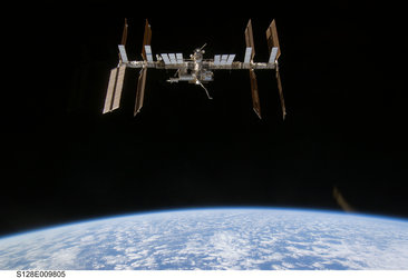 The International Space Station is seen from Space Shuttle Discovery